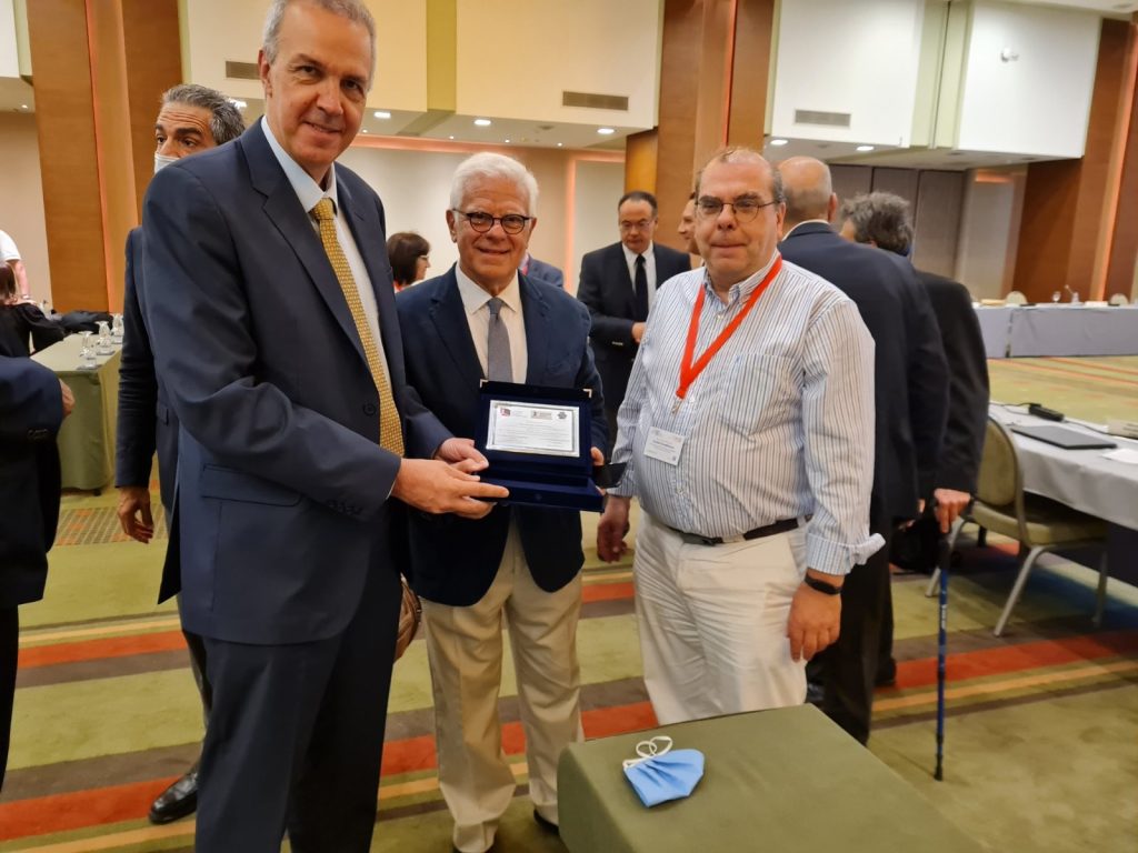 A picture containing person, indoor, floor, suit

Description automatically generated